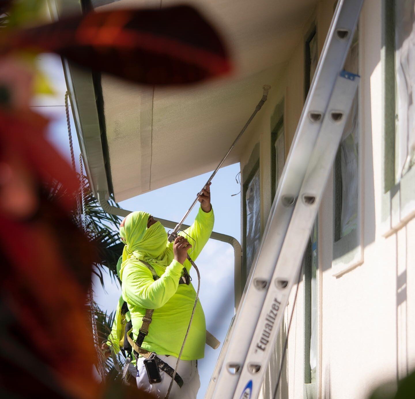 Pressure washing and surface preparation before painting an Oahu home