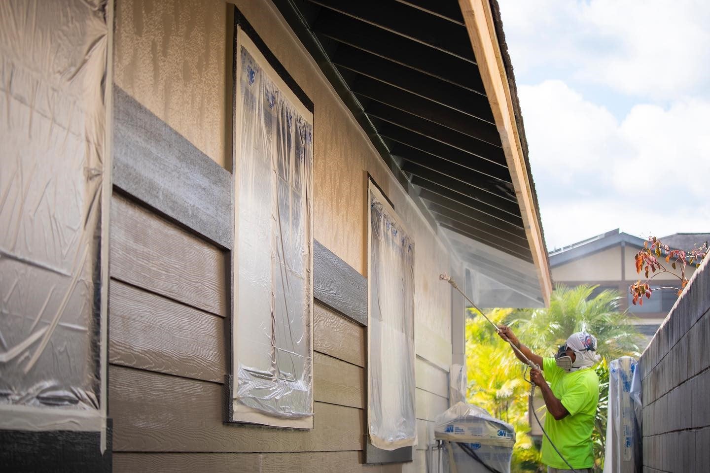 Exterior residential repaint in progress on Oahu, Hawaii