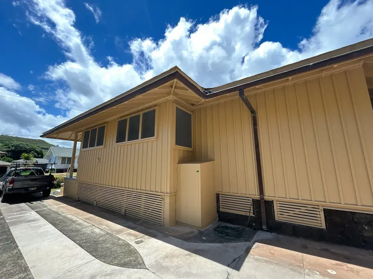 Single-story home with repainted tan exterior and carport in Wahiawa, Oahu